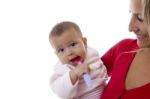 Mother Holding Her Baby Stock Photo