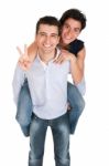 Brother And Sister Showing Victory Sign Stock Photo