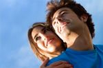 Portrait Of Young Couple Looking At The Horizon Stock Photo