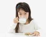 Little Girl Drinking Milk Stock Photo