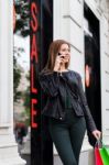 Shopping Woman Talking On The Phone Stock Photo