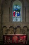 Altar And A Stained Glass Window In Winchester Cathedral Stock Photo