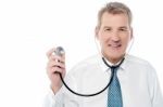 Doctor Posing With Stethoscope Stock Photo