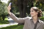 Woman Photographing With Mobile Phone Stock Photo