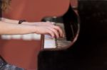 Girl Plays Piano Stock Photo