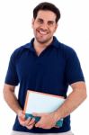 Young Man Holding Notepad Stock Photo