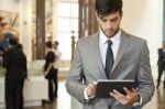 Businessman Working On The Digital Tablet Stock Photo