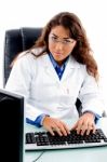 Doctor Working On Computer Stock Photo