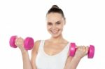 Lady Holding Dumbbells Stock Photo