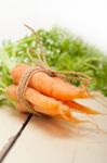 Baby Carrots Bunch Tied With Rope Stock Photo