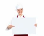 Female Chef Pointing Blank Board Stock Photo