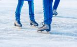 Young Girls Are Skating. Feet Closeup Stock Photo