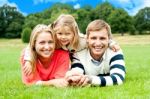 Smiling Family In Outdoors Stock Photo