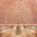 Stone Wall Interior With Wood Floor Foreground Stock Photo