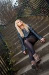 Blonde Caucasian Girl Posing Outdoors Stock Photo