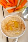 Fresh Hummus Dip With Raw Carrot And Celery Stock Photo