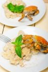 Italian Gnocchi With Seafood Sauce With Crab And Basil Stock Photo