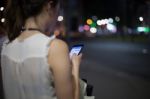 Woman Use Of Cellphone At Outdoor Stock Photo