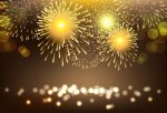 Golden Firework On City Landscape Background For Celebration Stock Photo