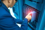 Man Fix Server Network In Data Center Room Stock Photo