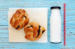 Breakfast With Bread Roll And Milk Stock Photo