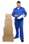 Young Man Holding Clipboard Stock Photo