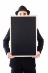 Businessman Holding A Blackboard Stock Photo