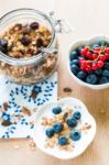 Healthy Breakfast With Granola, Yogurt And Fresh Fruits Stock Photo