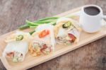 Fresh Spring Rolls On Wooden Table Stock Photo