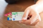 Chiang Rai, Thailand - March 3, 2016: Woman's Hand Holding Visa Stock Photo