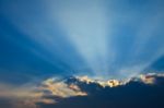 Sun Ray Behind Dark Cloud Stock Photo