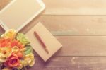 Notebooks And Tablets On A Wooden Stock Photo