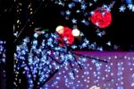 Red Bright Balls With White Foreground Lights Stock Photo