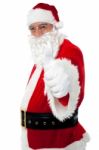 Happy Santa Gesturing Thumbs Up Stock Photo