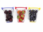 Fresh Summer Fruits, Cherry, Strawberry, And Blueberry In Shoppi Stock Photo