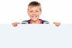 Young Boy Holding Blank Board Stock Photo