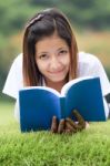 Young Women Open A Book Stock Photo