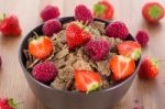 Bran Flakes With Fresh Raspberries And Strawberries Stock Photo