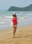 Woman Full Length With Relaxing On The Beach Stock Photo