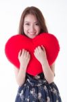 Asian Woman Holding A Red Heart Stock Photo