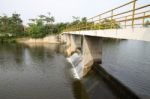 Bridge Over Small Dam Cross River Stock Photo