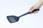 Black Plastic Kitchen Spatula On White Background Stock Photo