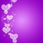 Mauve Hearts Bokeh Background Stock Photo