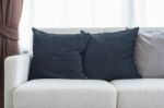 Black Pillows On White Sofa In Modern Living Room Stock Photo