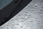 Water Drop On Car Background Stock Photo