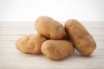 Potato Still Life On Wood Background Stock Photo