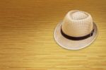 Hat On Wooden Floor Stock Photo