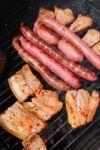 Tasty Meal With Fresh Meat On Grill Stock Photo