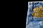 Coin Stack And Blue Jeans Lack Stock Photo