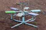 Rusty Merry Go Round On Floor Ground Stock Photo